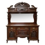 EASTERN EUROPEAN CARVED WALNUT MIRRIORED-BACK DRESSER, LATE 19TH CENTURY