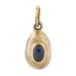 A RUSSIAN GOLD-MOUNTED SILVER AND SAPPHIRE MINIATURE EASTER EGG PENDANT