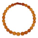 SET OF FOUR AMBER BEADED NECKLACES