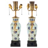 A PAIR OF PORCELAIN JAPANOISERIE VASES, CONVERTED INTO LAMP BASES