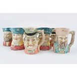 SET OF SEVEN POLYCHROME CHARACTER JUGS