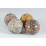 GROUP OF FOUR SPECIMEN MARBLE BALLS