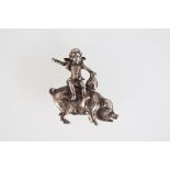 STERLING SILVER CHERUB MOUNTED ON A PIG