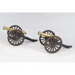 PAIR OF CAST IRON AND BRASS LIBRARY CANONS