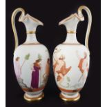 PAIR OF PORCELAIN PARCEL GILT EWERS