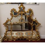 PAIR OF VENETIAN CARVED GILTWOOD MIRRORS