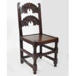 PAIR OF 17TH-CENTURY CROMWELLIAN CARVED OAK CHAIRS