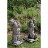 PAIR OF MOULDED STONE DOGS