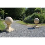 PAIR OF ITALIANATE STONE PIER FINIALS