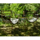 PAIR OF 19TH-CENTURY WROUGHT IRON X-FRAMED CHAIRS