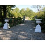 PAIR OF CAST IRON URNS