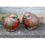 TWO MOULDED STONE BIRDS
