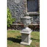 PAIR OF NEO-CLASSICAL MOULDED STONE URNS