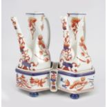 PAIR OF IMARI PATTERN EWERS ON STAND