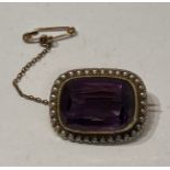 15CT YELLOW GOLD AMETHYST AND SEED PEARL BROOCH