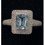 18CT WHITE GOLD AQUAMARINE AND DIAMOND RING