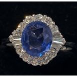 18CT WHITE GOLD SAPPHIRE AND DIAMOND CLUSTER RING