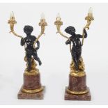 PAIR OF REGENCY GILT BRONZE CHERUB STEMMED CANDELABRA