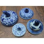 FOUR BLUE AND WHITE CHINESE POT LIDS