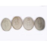 SET OF FOUR NEOCLASSICAL OVAL PLASTER PLAQUES