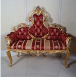 ARMORIAL CARVED GILTWOOD SETTEE