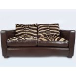 PAIR OF HIDE UPHOLSTERED DESIGNER SETTEES