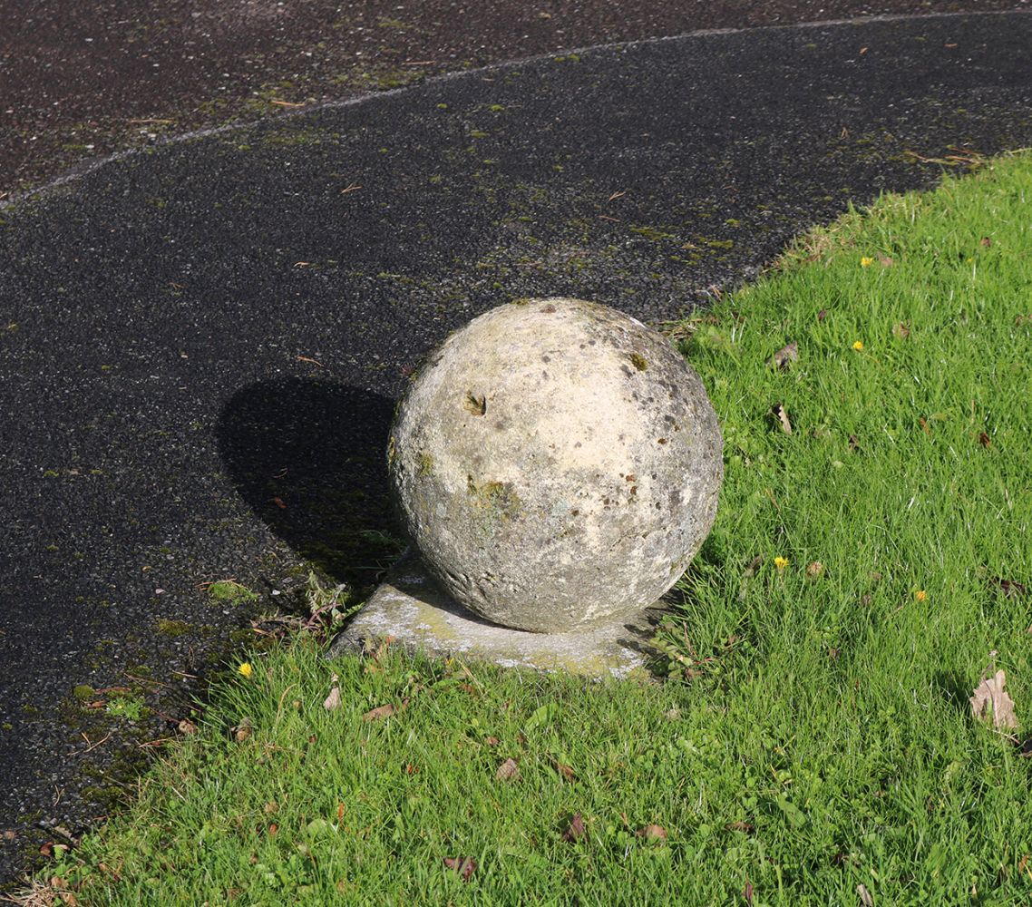 PAIR OF WEATHERED EDGING BALLS