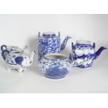 FIVE ORIENTAL BLUE AND WHITE TEA POTS