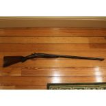 19TH-CENTURY DOUBLE BARREL SHOTGUN