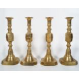 SUITE OF 4 GEORGIAN BRASS CANDLESTICKS