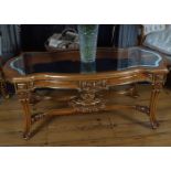 CARVED AND PARCEL GILT COFFEE TABLE
