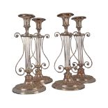 SUITE OF FOUR SHEFFIELD LYRE STEMMED CANDLESTICKS