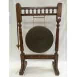 Victorian brass dinner gong in galleried mahogany stand