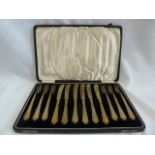 Cased gold plated knife and fork set( stamped Auphir)
