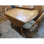 Ercol drop leaf kitchen table and 2 chairs