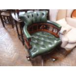 Green buttoned leather captains style swivel office chair