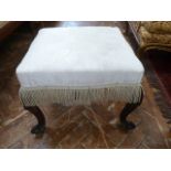 Carved mahogany cabriole leg upholstered footstool