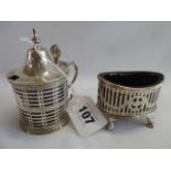 Pierced silver mustard pot - London 1898 and pierced silver salt - London 1903 with blue glass