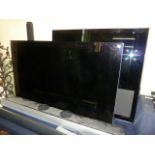 2 Bang and Olufsen Beo-vision televisions, surround sound speakers and remote controls etc NB,