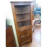 Priory style oak corner cupboard