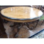 19thC inlaid walnut and mahogany oval tilt top loo table