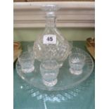 Cut glass liqueur decanter and set 6 glasses on circular tray