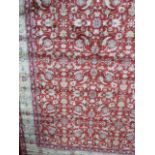 Red ground Kashmir all over floral design rug (2.4 x 1.