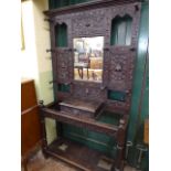 19thC carved oak hall stand with green man mask drawer pull to glove box (79" x 44")