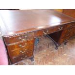 Early 20thC mahogany leather top pedestal partners desk on ball and claw feet