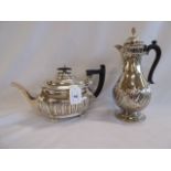 Silver teapot (Walker & Hall) Sheffield 1909 and a silver coffee pot - London 1888 (37 ozt)