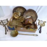 Brass trivets, copper kettle,