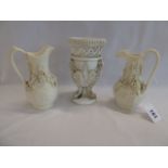 Pair Parian Ware grapevine jugs and a moulded gryphon chalice cup or vase (glued)