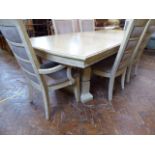 "Brunswick" classic design extending dining table and 6 suede back chairs (Mark Webster)