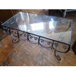 Wrought iron glass top coffee table